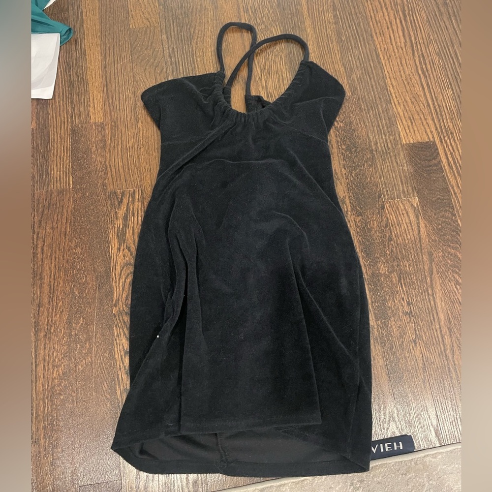 This is a mini black dress from Pacsun. It is a size small.